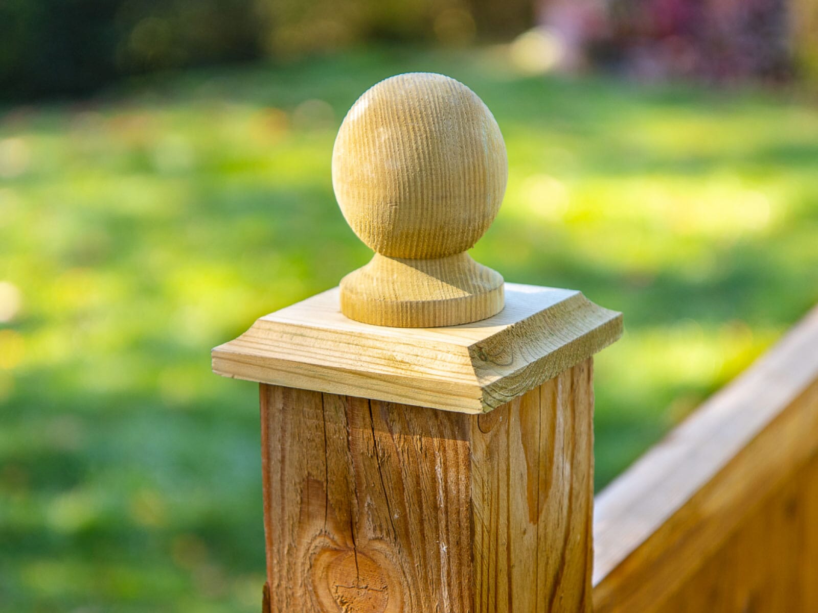 4-inch-post-cap-green-on-fence-with-finial 4-inch-post-cap-green-on-fence-with-finial